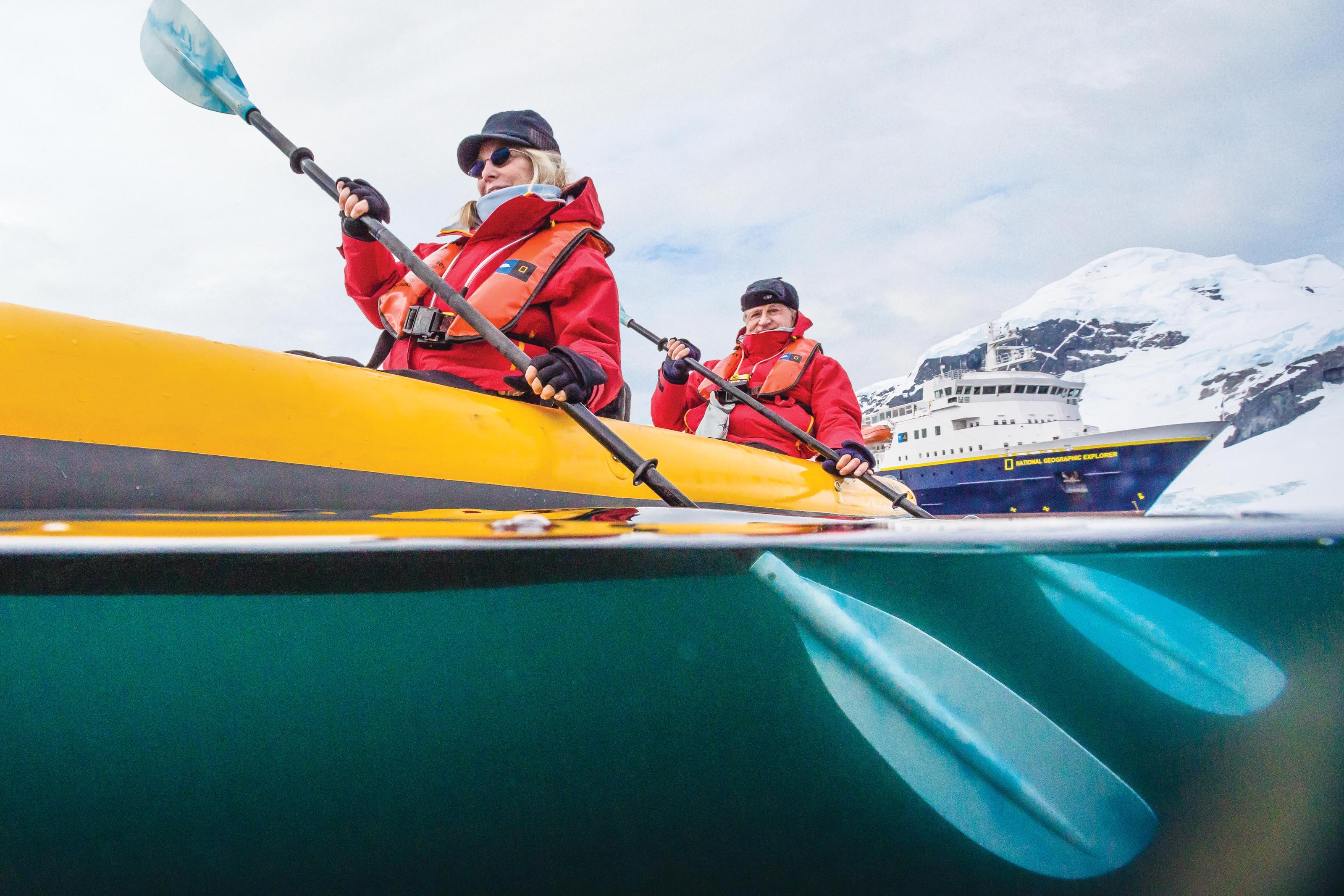 A couple kayaks in Antarctic waters